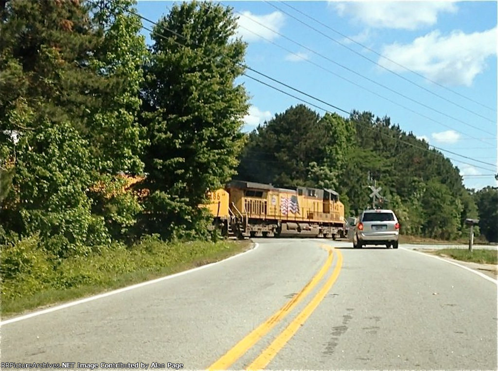 UP AC44CWCTE 5942 and C41-8W 9486